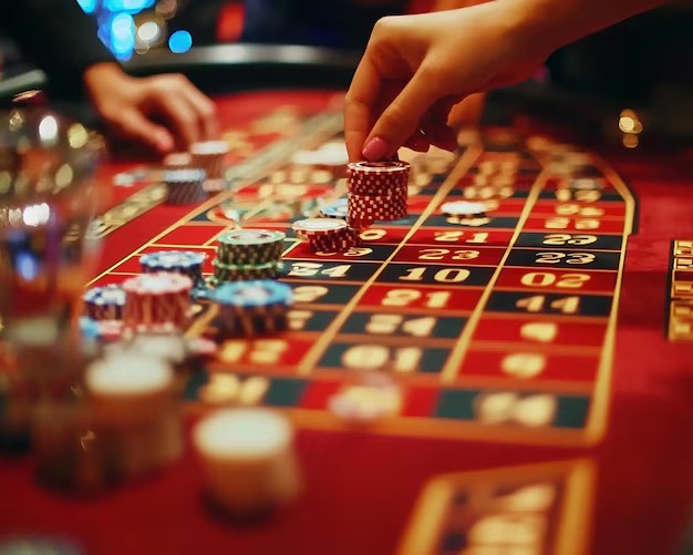 dasi4d Caribbean Stud Poker live table showing dealer and player cards with payout schedule
